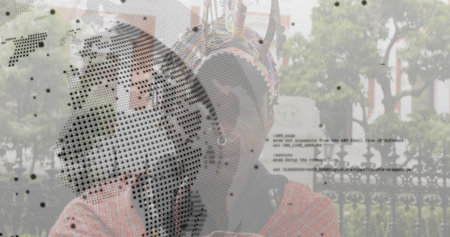 Standing man wearing red shirt and straw hat in courtyard, with woven container and code overlay. Bohemian, vibrant, rustic, cultural, outdoor, artistic, contemplativeの写真素材