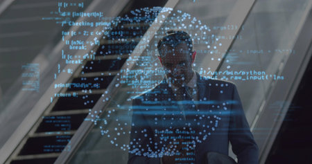 Standing business professional checking smartphone in corporate lobby, with code and network sphere. Technology, innovation, corporate, networking, futuristic, digital, professionalの写真素材