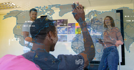 Group of three professionals collaborating in office meeting room, with world map and tablet. Collaboration, technology, data visualization, innovation, teamwork, corporate, modern designの写真素材