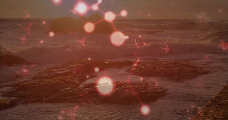 Overlaying red molecular pattern showing glowing nodes and lines over jagged shore, waves at sunset. Landscape, abstract, digital, environmental, futuristic, innovation, serenityの写真素材
