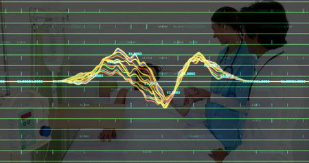Medical team in scrubs monitoring patient in hospital bed, with heart monitor waveform, copy space. Healthcare, clinical, diagnostics, professionalism, medical equipment, teamwork, modernの写真素材