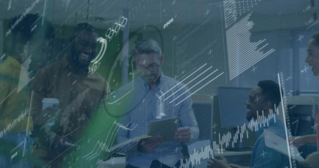 Reviewing team analyzing digital projections at office desk, with tablet, coffee cup and documents. Collaboration, teamwork, analytics, modernoffice, professional, innovation, data visualizationの写真素材