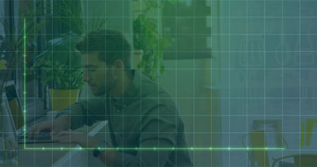 Typing office worker wearing business attire at office desk, with laptop mouse plants grid overlay. Professional, workspace, minimalism, productivity, technology, corporate, modernの写真素材