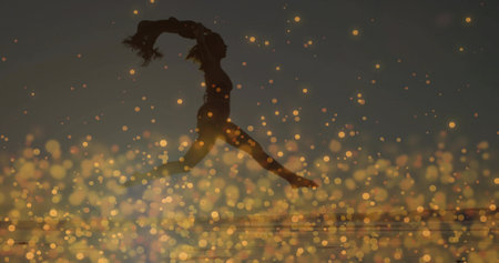Leaping silhouetted athlete in swimwear vaulting over shimmering water at lake, with golden bokeh. Fitness, motion, vitality, outdoor, serenity, inspiration, dynamicの写真素材
