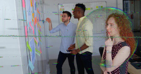 Brainstorming three coworkers pointing at whiteboard sticky notes in office meeting area, glitching....