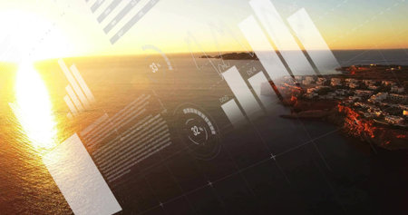 Displaying HUD overlay over aerial coastal sunset scene, with bar graphs, line charts. Aerial view, coastal landscape, data visualization, futuristic interface, maritime environment, sunset lightingの写真素材