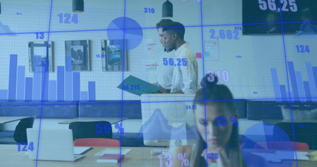 Reviewing teal folder, two men in shirts checking charts on wall display at office table. Data,...