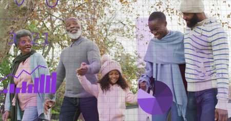 Walking multigenerational family holding hands on park path, wearing fall sweaters, purple overlays....