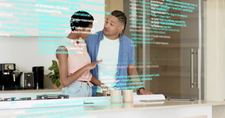 Discussing couple talking and gesturing at kitchen island, woman wearing pink top, code overlay....