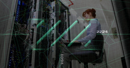 Working woman in blue shirt troubleshooting server racks with laptop and AR overlays, copy space....
