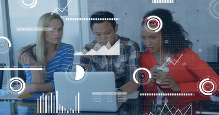 Analyzing team in red blazer, striped top at silver laptop holding coffee cup showing data overlays. Collaboration, analysis, meeting, office, trio, visualization, chartsの写真素材