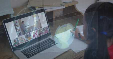 Writing kid at home wearing headphones using laptop HUD-overlay, green pencil and paper, copy space....
