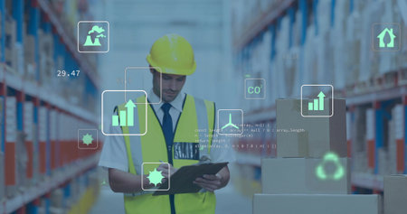 Warehouse inspector with yellow hard hat and vest checking clipboard near boxes with smart overlays....
