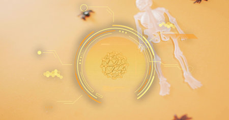 Displaying holographic circle with molecular cluster on orange table, skeleton toy. Flatlay, glow,...