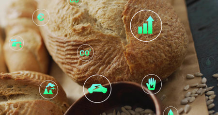 Featuring artisanal round loaf showcasing crust on rustic table, with seeds, baguette. Bread, handcrafted, bakery, parchment, kitchen, wooden, bokehの写真素材