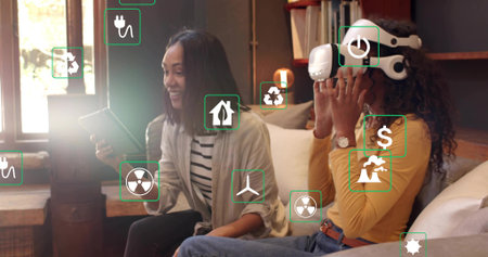 Holding tablet women in mustard top adjusting VR headset green AR icons overlaying in living room....