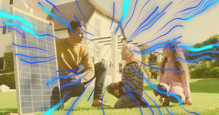 Showing man-in-mustard-knit holding solar panel on lawn by house, 2 kids listening, cyan overlay. Family, backyard, module, teaching, education, sunny, suburbanの写真素材