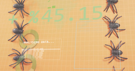 Dominating data overlay showing ANALYSING DATA panel on orange grid, with black plastic spiders. Holographic, hud, topdown, tabletop, binary, numbers, arachnidの写真素材