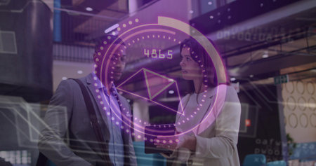 Discussing two colleagues in suit and blazer using tablet and viewing AR HUD in office atrium. Futuristic, collaboration, corporate, lobby, mezzanine, glass, projectionの写真素材