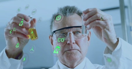 Senior scientist wearing white lab coat and goggles comparing two vials in lab with green icons....