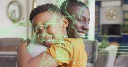 Hugging father and son sharing embrace at home on sofa, child in mustard top, AR overlay. Family, warmth, affection, cozy, livingroomの写真素材