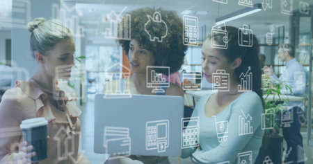 Talking three team members by open laptop in office with coffee. Coworkers, workspace, collaboration, modern, business, charts, calculatorの写真素材