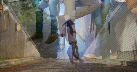 Sitting group of adults wearing casual clothes chatting on urban ledge, with brick walls and shoes. People, cityscape, outdoor, doubleexposure, street, greenery, motionの写真素材