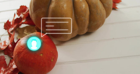 Displaying red gourd on white slats showing teal bubble with red leaves and tan pumpkin. Autumn, centerpiece, tabletop, decor, studio, photography, warmthの写真素材