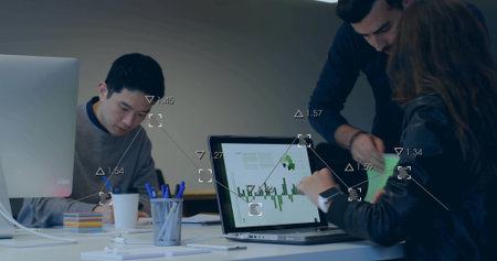 Reviewing three colleagues wearing office attire examining laptop green chart at office table....