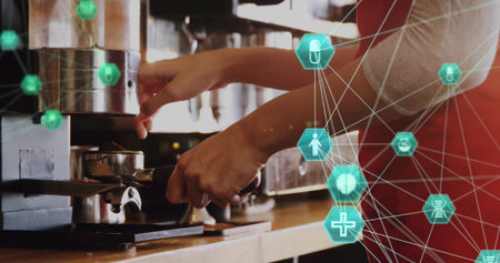 Pulling barista hands locking portafilter into espresso machine at cafe, teal overlay, red apron. Coffee, manual, precision, warmth, woodgrain, stainless, macroの写真素材