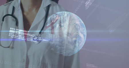 Showing midadult doc standing in studio wearing lab coat stethoscope with holo globe, pink ribbon. Futuristic, healthcare, holographic, earth, awareness, data, professionalの写真素材