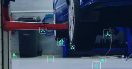 Showing blue car rear wheel being lifted on vehicle lift in garage, eco overlays, copy space....
