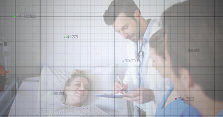 Examining doctor in white coat, nurse in scrubs assessing patient on hospital bed, with data grid. Clinical, teamwork, healthcare, consultation, analytics, visualization, wardの写真素材