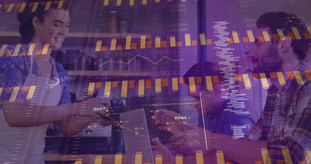 Serving barista in apron handing cup to customer holding phone at cafe with laptop, overlaid charts. Coffeehouse, collaboration, analytics, data, espresso, interior, cozyの写真素材