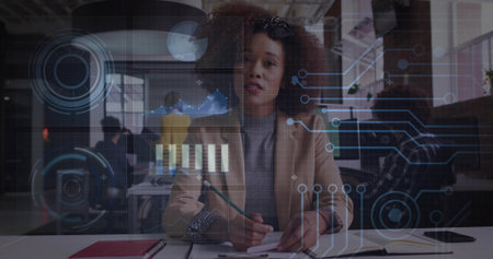 Writing woman in beige blazer addressing virtual presentation at open plan office, holographic UI. Collaboration, coworking, technology, hologram, analytics, focused, minimalistの写真素材