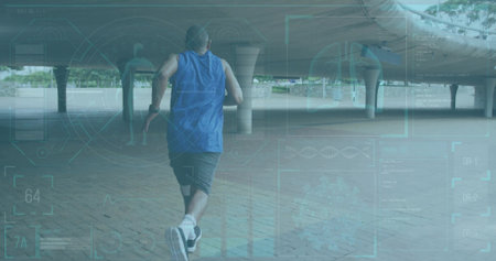 Running mid-adult male in blue sleeveless top passing under curved canopy. Runner, outdoor, plaza,...