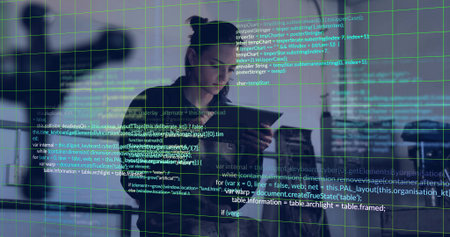Standing woman wearing dark jacket collared shirt studying code overlay at office glass with grid. Programming, gridlines, workspace, cityscape, blue, teal, focusedの写真素材