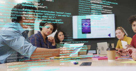 Discussing six-person team in smart casual reviewing app in office with wall monitor and laptop. Collaboration, ui, prototype, display, mobile, notes, brainstormingの写真素材