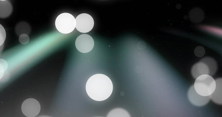 Glowing bright white circular bokeh near center on stage, casting soft teal and lavender beams....