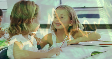 Smiling student at desk in classroom, holding pencil, in white top, with notebook and graph overlay. Learning, collaboration, school, peers, chart, doubleexposure, brightの写真素材