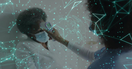 Checking senior patient masked, scrub nurse aiming IR temp gun in clinic, teal overlay, copy space....