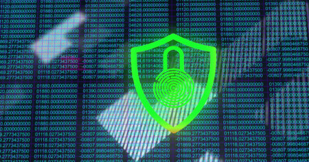 Displaying green shield with padlock fingerprint on screen, hands hovering in longsleeve shirt....