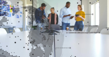 Discussing four staff wearing business-casual in conference room with tablet notebook at long table. Collaboration, colleagues, daylight, glass, map, whiteboard, officeの写真素材