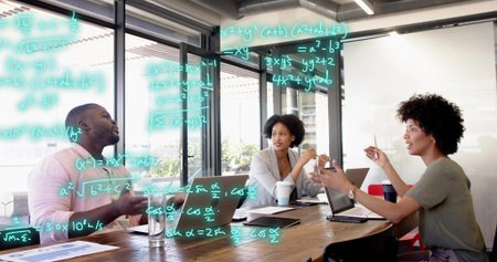 Discussing three teammates in office attire in glass office at wooden table with laptops teal math....
