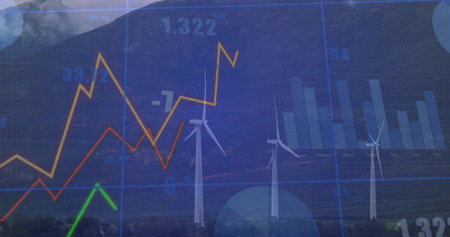 Displaying wind turbines at rural wind farm with data visualization overlay, colored line graphs....