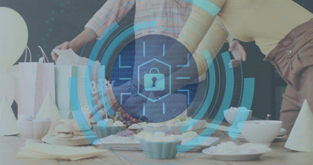 Reaching friends in plaid shirt leaning around wood table at party with pastel bags, padlock icon....
