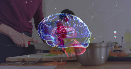 Displaying 3D brain overlay over kitchen counter, man chopping tomatoes with chef's knife on board. Multicolor, holographic, translucent, augmented, reality, neuroscience, cognitionの写真素材