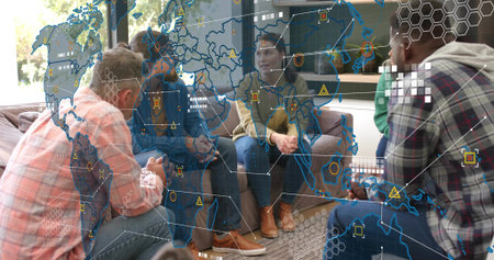 Discussing data, five colleagues in jeans and plaid shirts in office lounge, viewing AR map....