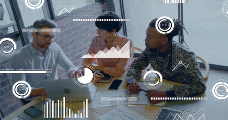 Reviewing business-casual team of three collaborating at modern office table, using laptop and HUD. Industrial, brick, daylight, workspace, analytics, insights, dataの写真素材