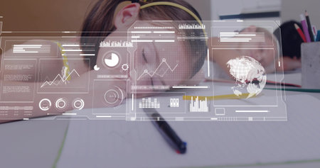 Resting child wearing yellow headband leaning on notebook at desk, with pencil, cup. Classroom, study, children, focus, learning, charts, analyticsの写真素材